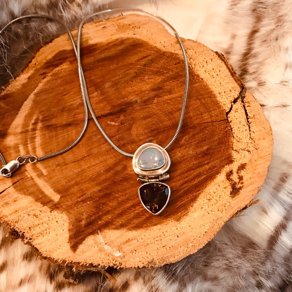 Sterling silver opal and brown stone necklace.